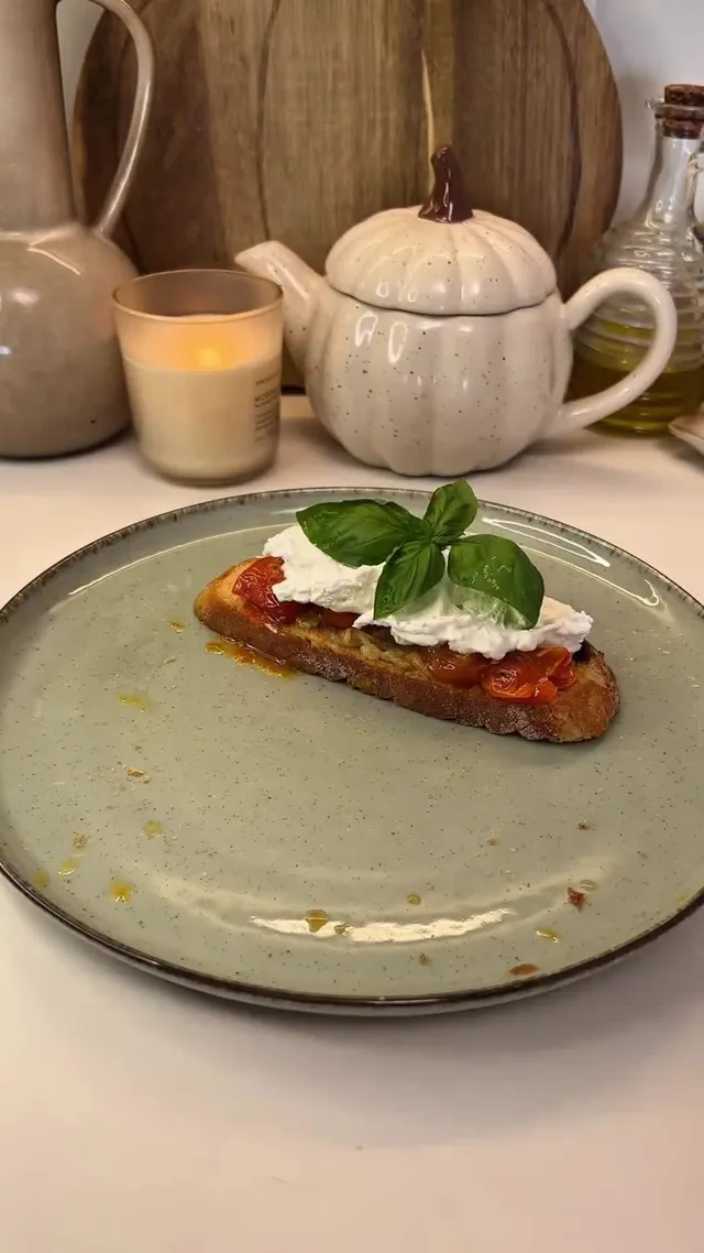Bruschetta with Confit Cherry Tomatoes, Garlic and Burrata